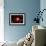 A Red Giant Star System-null-Framed Art Print displayed on a wall