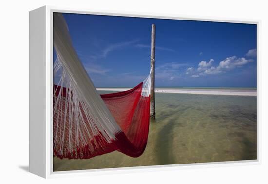 A Red Hammock Spread Out by the Wind Swings Above the Water During Low Tide, Hobox Island, Mexico-Karine Aigner-Framed Premier Image Canvas