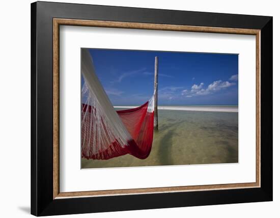 A Red Hammock Spread Out by the Wind Swings Above the Water During Low Tide, Hobox Island, Mexico-Karine Aigner-Framed Photographic Print