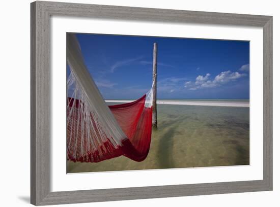 A Red Hammock Spread Out by the Wind Swings Above the Water During Low Tide, Hobox Island, Mexico-Karine Aigner-Framed Photographic Print