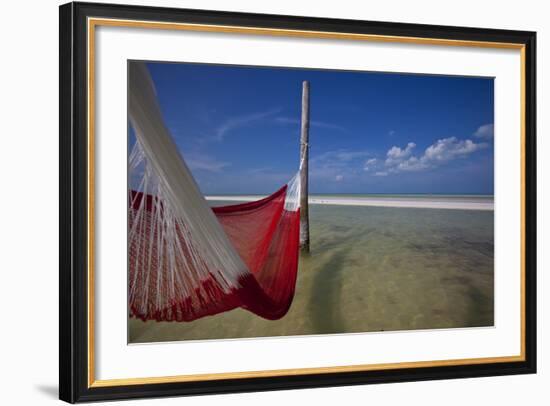 A Red Hammock Spread Out by the Wind Swings Above the Water During Low Tide, Hobox Island, Mexico-Karine Aigner-Framed Photographic Print