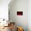 A red spiral-Inge Schuster-Photographic Print displayed on a wall