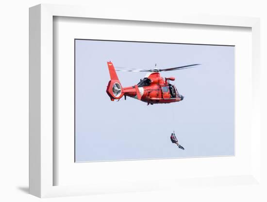 A Rescue Swimmer Is Lowered from a U.S. Coast Guard Hh-65 Dolphin Helicopter-Stocktrek Images-Framed Photographic Print