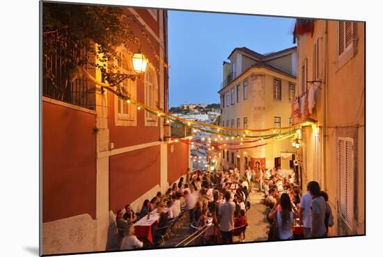 A Restaurant in the Calcada Do Duque, with a View to Sao Jorge Castle at Twilight. Lisbon, Portugal-Mauricio Abreu-Mounted Photographic Print