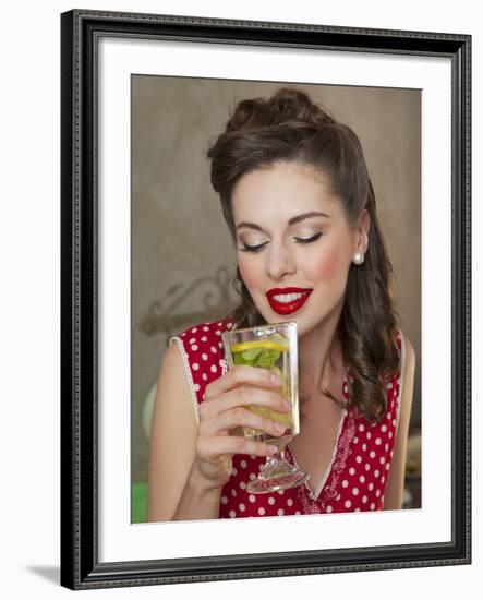 A Retro-Style Girl Drinking Lemonade--Framed Photographic Print