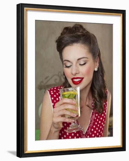 A Retro-Style Girl Drinking Lemonade--Framed Photographic Print