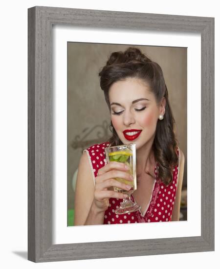 A Retro-Style Girl Drinking Lemonade-null-Framed Photographic Print