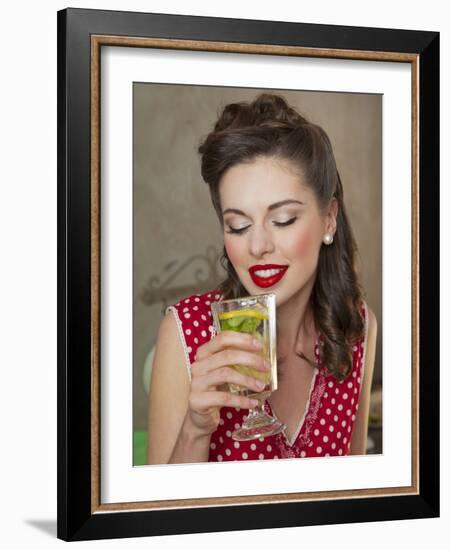 A Retro-Style Girl Drinking Lemonade-null-Framed Photographic Print