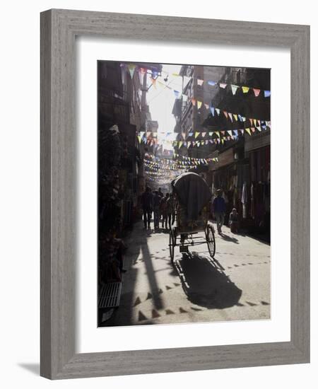 A Rickshaw Driving Through the Streets of Kathmandu, Nepal, Asia-John Woodworth-Framed Photographic Print