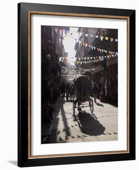 A Rickshaw Driving Through the Streets of Kathmandu, Nepal, Asia-John Woodworth-Framed Photographic Print