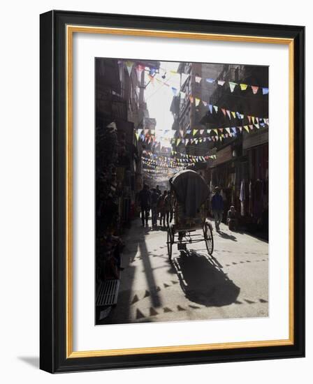 A Rickshaw Driving Through the Streets of Kathmandu, Nepal, Asia-John Woodworth-Framed Photographic Print