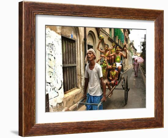 A Rickshaw Puller Carries Supporters of Brazil Soccer Team-null-Framed Photographic Print