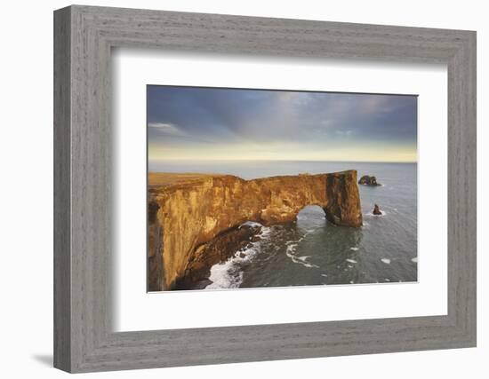 A rock arch on Dyrholaey Island seen in sunset sunlight, near Vik, south coast of Iceland-Nigel Hicks-Framed Photographic Print