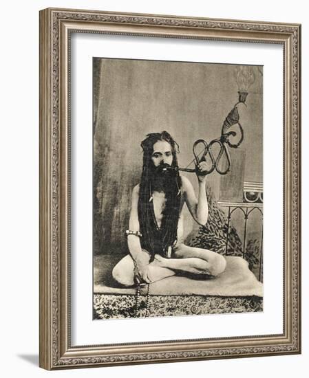 A Sadhu Smoking a Remarkable Pipe, India-null-Framed Photographic Print