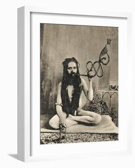 A Sadhu Smoking a Remarkable Pipe, India-null-Framed Photographic Print