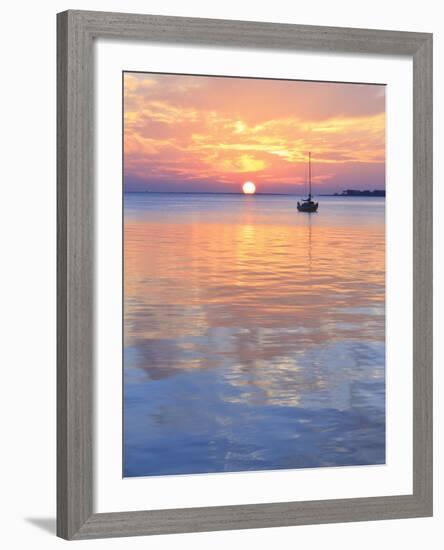 A Sailboat Silhouetted against a Brilliant Sunset in a Cove off Pensacola Bay, Florida-Colin D Young-Framed Photographic Print