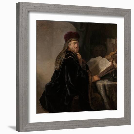 A Scholar Seated at a Desk (Scholar at His Stud)-Rembrandt van Rijn-Framed Giclee Print