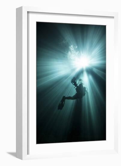 A Scuba Diver Ascends into the Light Emanating Above-null-Framed Premium Giclee Print