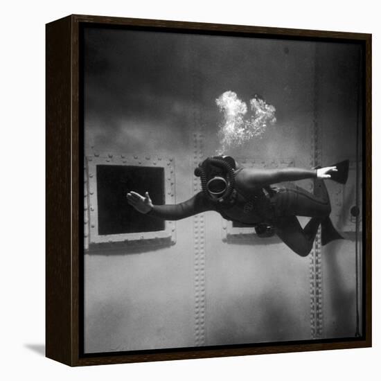 A Scuba Diver Inside a Large Metal Water Tank. Photograph by Heinz Zinram-Heinz Zinram-Framed Premier Image Canvas