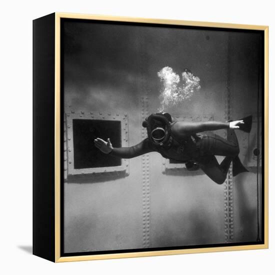 A Scuba Diver Inside a Large Metal Water Tank. Photograph by Heinz Zinram-Heinz Zinram-Framed Premier Image Canvas