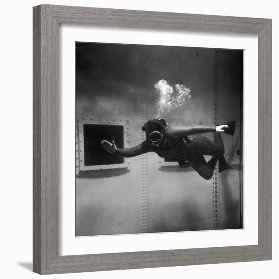 A Scuba Diver Inside a Large Metal Water Tank. Photograph by Heinz Zinram-Heinz Zinram-Framed Photographic Print