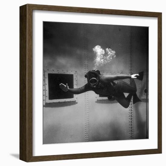 A Scuba Diver Inside a Large Metal Water Tank. Photograph by Heinz Zinram-Heinz Zinram-Framed Photographic Print