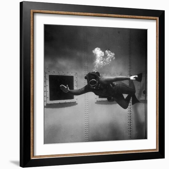 A Scuba Diver Inside a Large Metal Water Tank. Photograph by Heinz Zinram-Heinz Zinram-Framed Photographic Print