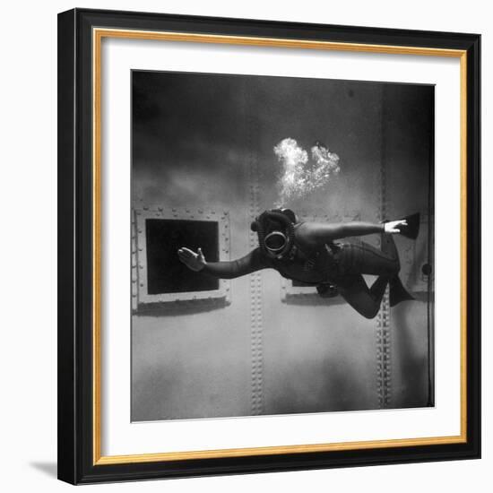 A Scuba Diver Inside a Large Metal Water Tank. Photograph by Heinz Zinram-Heinz Zinram-Framed Photographic Print