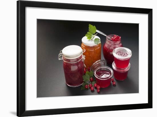 A Selection of Jams and Jelly in Jars, Redcurrants and Leaves-Foodcollection-Framed Photographic Print