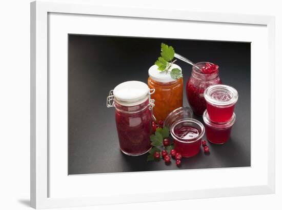 A Selection of Jams and Jelly in Jars, Redcurrants and Leaves-Foodcollection-Framed Photographic Print