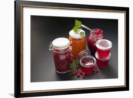 A Selection of Jams and Jelly in Jars, Redcurrants and Leaves-Foodcollection-Framed Photographic Print