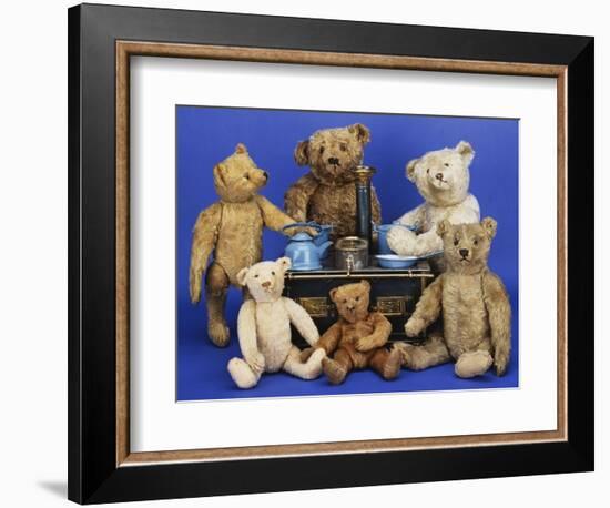 A Selection of Teddy Bears around a Black Painted Tinplate Toy Stove-null-Framed Giclee Print