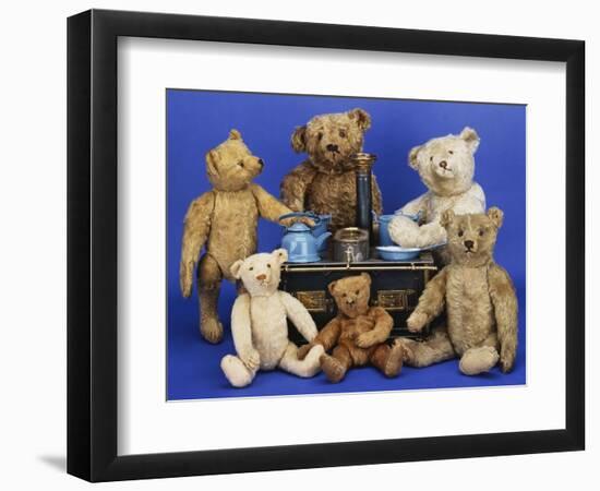 A Selection of Teddy Bears around a Black Painted Tinplate Toy Stove-null-Framed Giclee Print