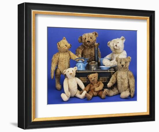 A Selection of Teddy Bears around a Black Painted Tinplate Toy Stove-null-Framed Giclee Print