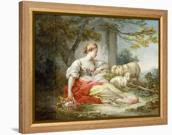 A Shepherdess Seated with Sheep and a Basket of Flowers Near a Ruin in a Wooded Landscape-Jean-Honoré Fragonard-Framed Premier Image Canvas