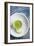 A Shot Of Wheat Grass In A Small Cup On A White Plate Served With A Lemon Wedge And Cayenne Pepper-Shea Evans-Framed Photographic Print