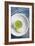 A Shot Of Wheat Grass In A Small Cup On A White Plate Served With A Lemon Wedge And Cayenne Pepper-Shea Evans-Framed Photographic Print