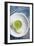 A Shot Of Wheat Grass In A Small Cup On A White Plate Served With A Lemon Wedge And Cayenne Pepper-Shea Evans-Framed Photographic Print