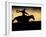 A Silhouetted Cowboy Riding Alone a Ridge at Sunset in Shell, Wyoming, USA-Joe Restuccia III-Framed Photographic Print
