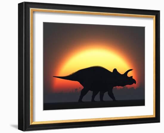 A Silhouetted Triceratops Strolling Past a Setting Sun at the End of a Prehistoric Day-Stocktrek Images-Framed Photographic Print