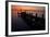 A Single Sailboat Sits on the Water of the Bay Alongside an Empty Dock on Tilghman Island, Maryland-Karine Aigner-Framed Photographic Print