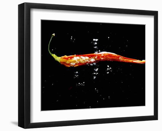 A Sliced Open Chilli Pepper in Water-null-Framed Photographic Print