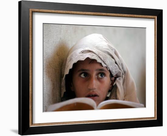 A Small Girl Takes Lessons at the Nangalam High School in Nangalam, Eastern Afghanistan-null-Framed Photographic Print
