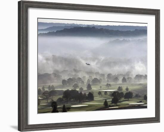 A Small Plane Descends Over Fog Covered Reeves Municipal Golf Course as It Lands at Lunken Airport-null-Framed Photographic Print