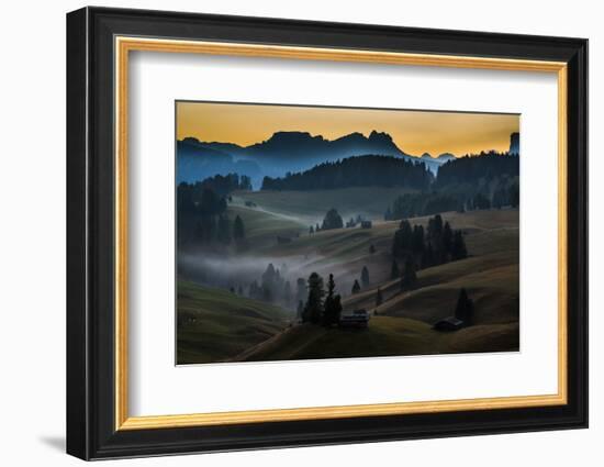 A small village on rolling hills as the sun rises over the Dolomites, Italy-Art Wolfe-Framed Photographic Print