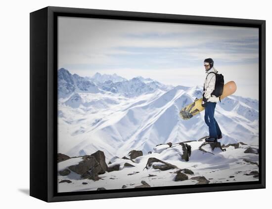 A Snowboarder at the Summit of Mount Affawat in Gulmarg, Kashmir, India-Julian Love-Framed Premier Image Canvas