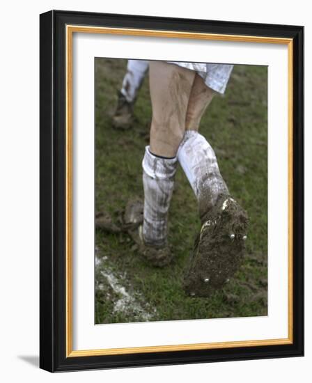 A Soccer Player's Muddy Cleats-null-Framed Photographic Print