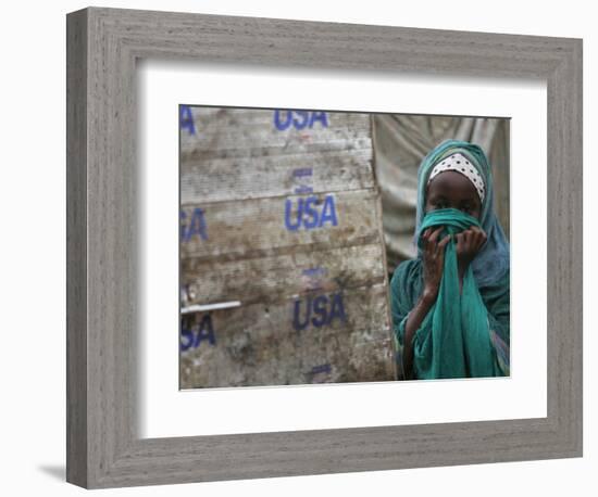 A Somali Child Covers Her Face at Dadaab Refugee Camp in Northern Kenya Monday, August 7 2006-Karel Prinsloo-Framed Photographic Print