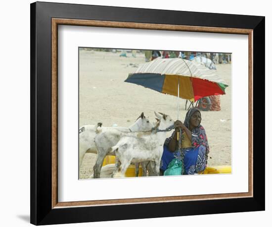 A Somaliland Woman Waits for Customers, in Hargeisa, Somalia September 27, 2006-Sayyid Azim-Framed Photographic Print