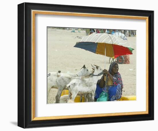 A Somaliland Woman Waits for Customers, in Hargeisa, Somalia September 27, 2006-Sayyid Azim-Framed Photographic Print